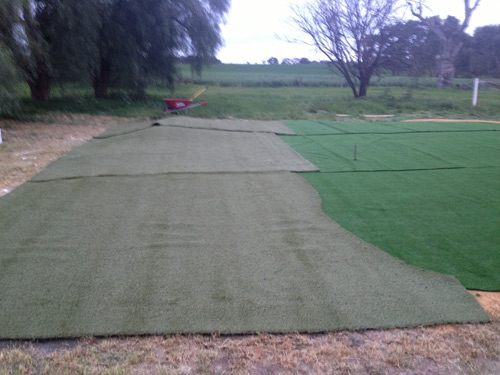 Green grass and fringe laid