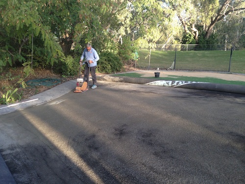 Compacting the crusher dust to ensure firm base